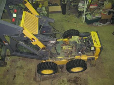 new holland skid steer tilting